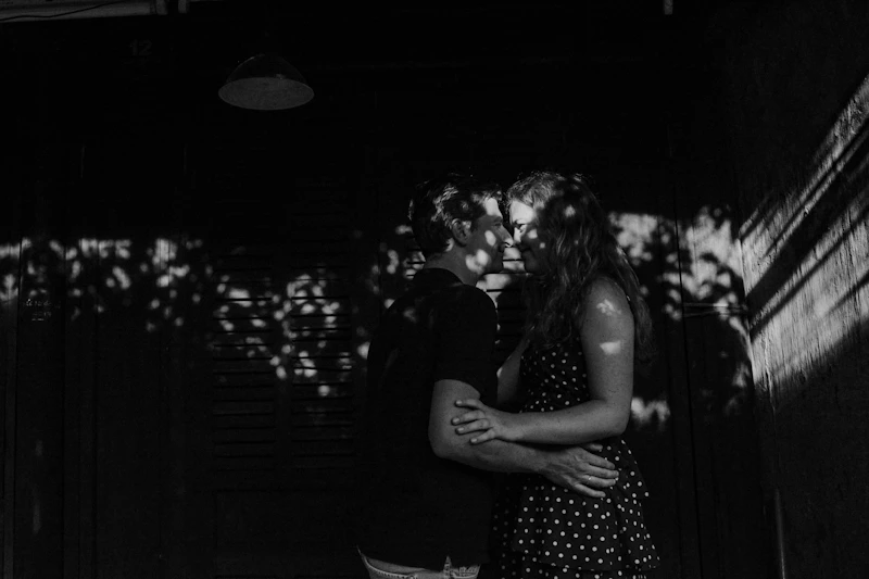 a man and woman kissing