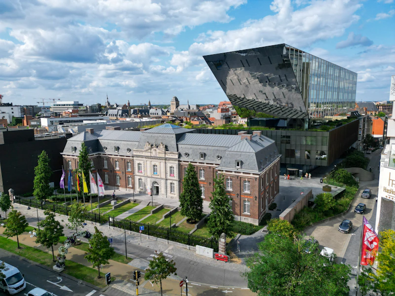An aerial view of a city with a large building