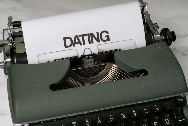 a close up of a typewriter with a paper on it